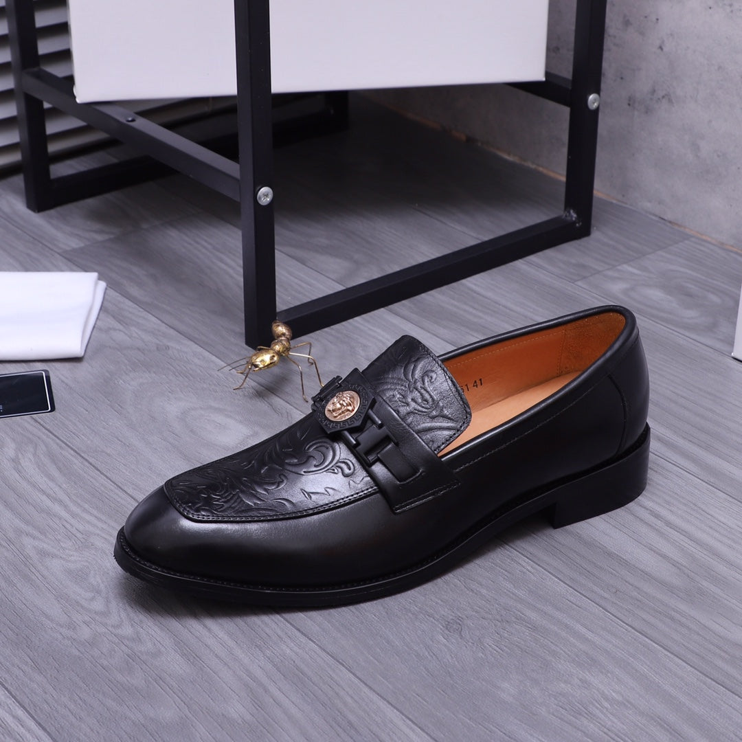 Versace black leather loafer with embossed detail and square buckle ornament