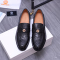 Versace black leather loafers with embossed pattern and buckle strap, round toe