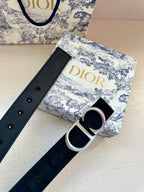 Navy belt with silver CD buckle and buttoned strap holes
