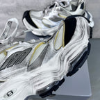 Unisex Balenciaga sneakers detail, silver leather with gold trim and textured black side panels
