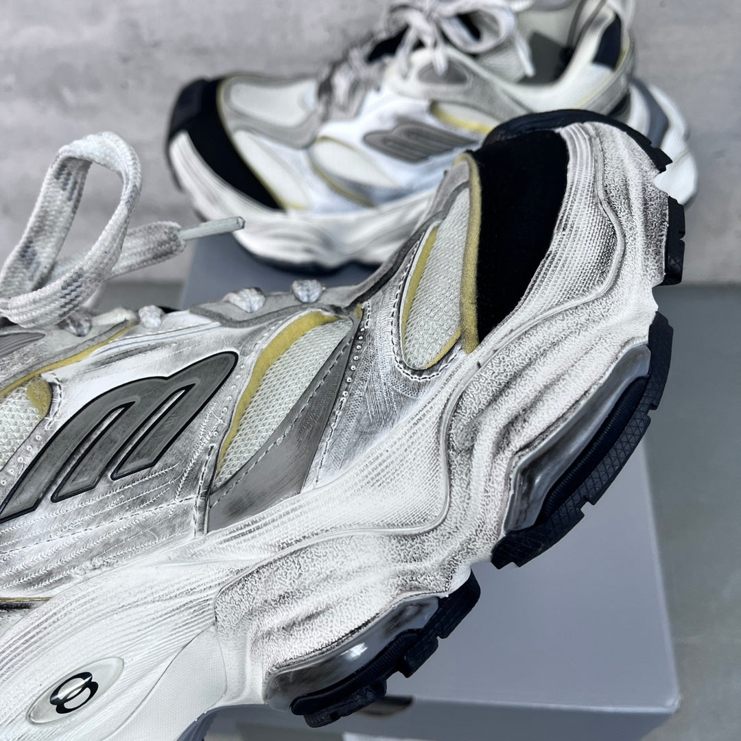 Unisex Balenciaga sneakers detail, silver leather with gold trim and textured black side panels