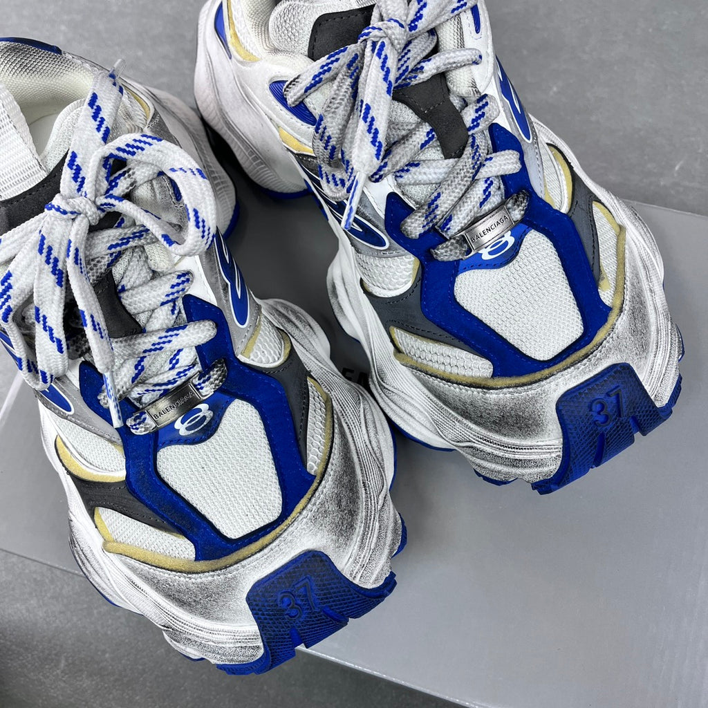 Balenciaga unisex sneakers, top view; white uppers with blue and silver details