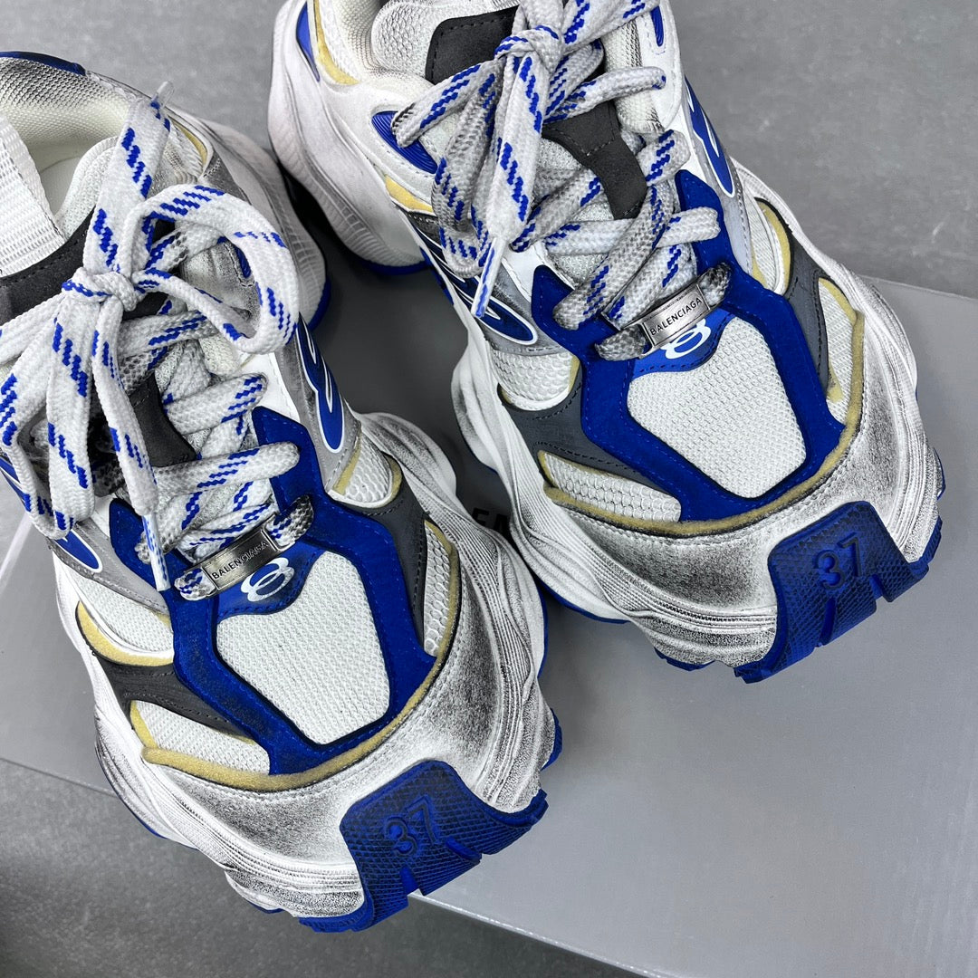 Balenciaga unisex sneakers, top view; white uppers with blue and silver details