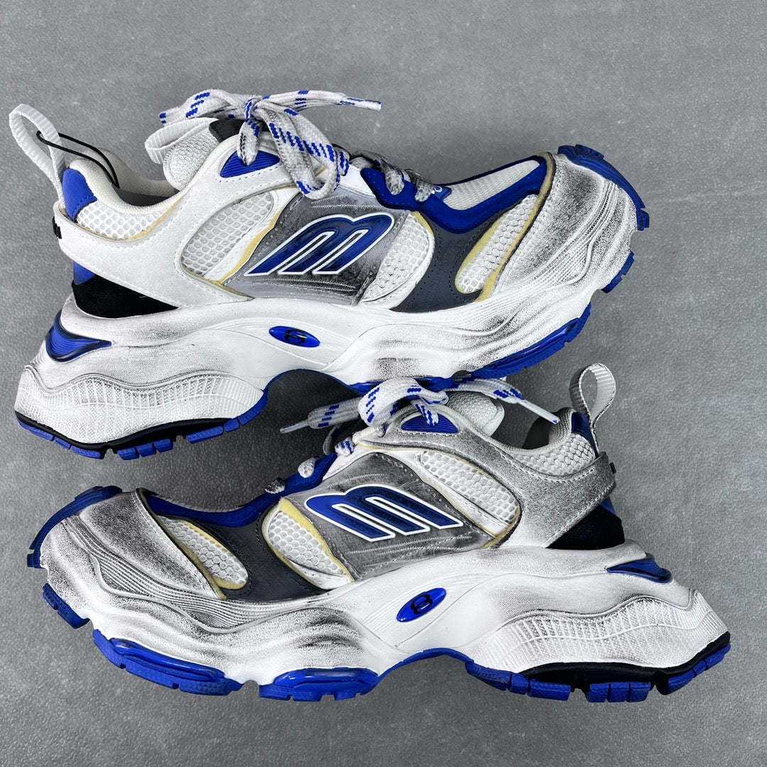 Balenciaga unisex chunky sneakers, front three-quarter view; white and silver with blue