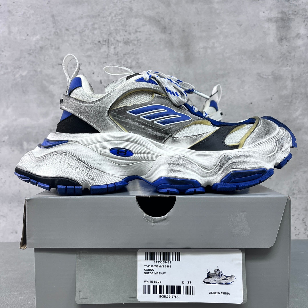 Balenciaga unisex chunky sneakers, side view; silver panels and blue tread sole