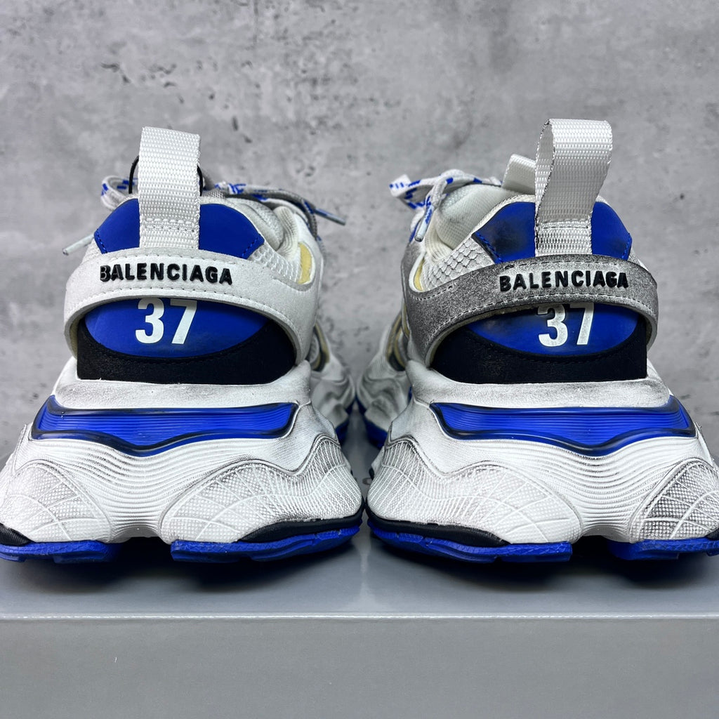 Balenciaga unisex sneakers, back view; BALENCIAGA logo and blue 37 heel