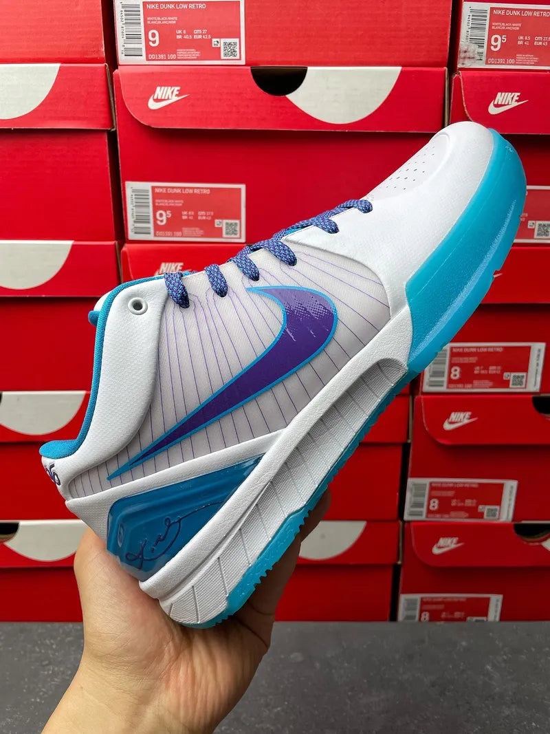 Nike Zoom Kobe 4 Protro sneakers, front-left view with blue swoosh and teal outsole