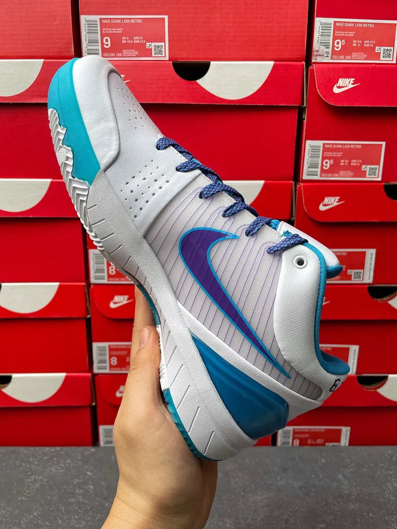 Nike Zoom Kobe 4 Protro sneakers, angled view with blue swoosh and padded heel