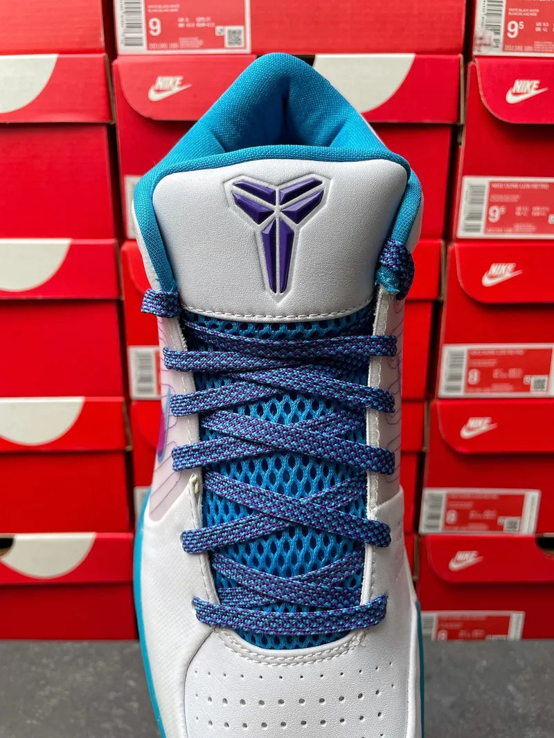 Nike Zoom Kobe 4 Protro sneakers, heel detail with purple logo and blue braided laces