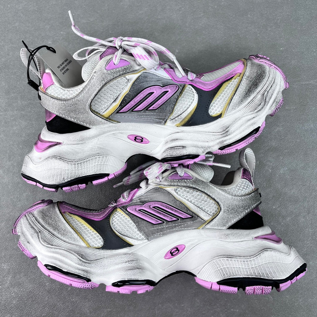 Silver and white sneakers with purple accents, lace-up design and chunky rubber outsole