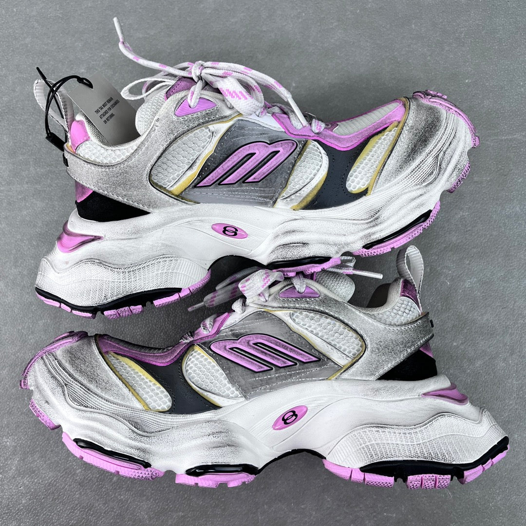 Silver and white sneakers with purple accents, lace-up design and chunky rubber outsole