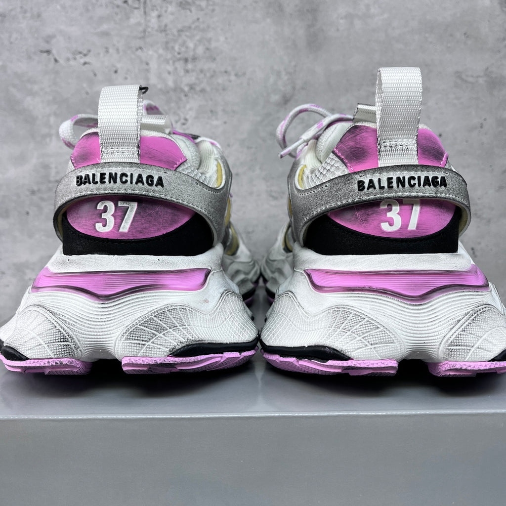 Heel view sneakers with Balenciaga logo tabs and size 37 on purple inner lining
