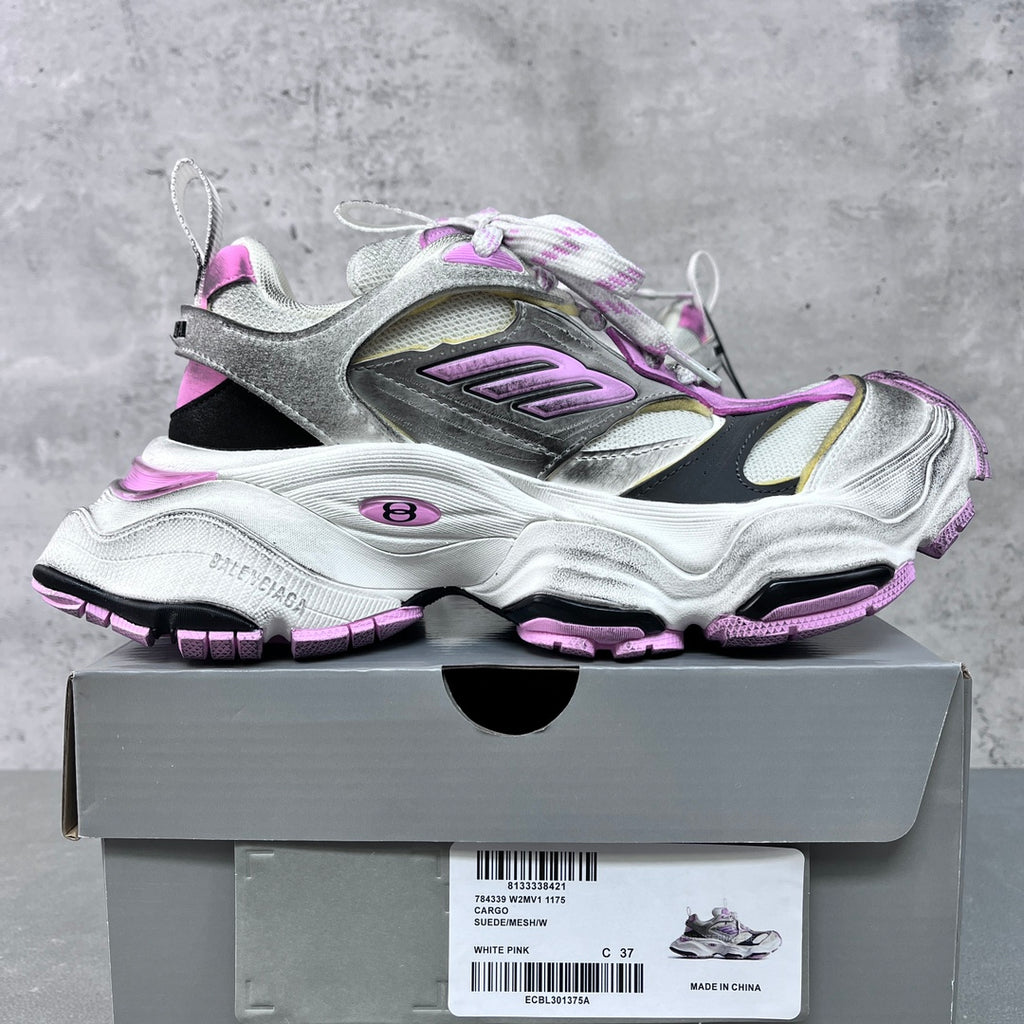 Chunky silver and white sneaker with purple trim, lace-up front and side logo patch