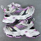 Two-tone silver and white sneaker with purple accents, chunky sole, lace-up and straps