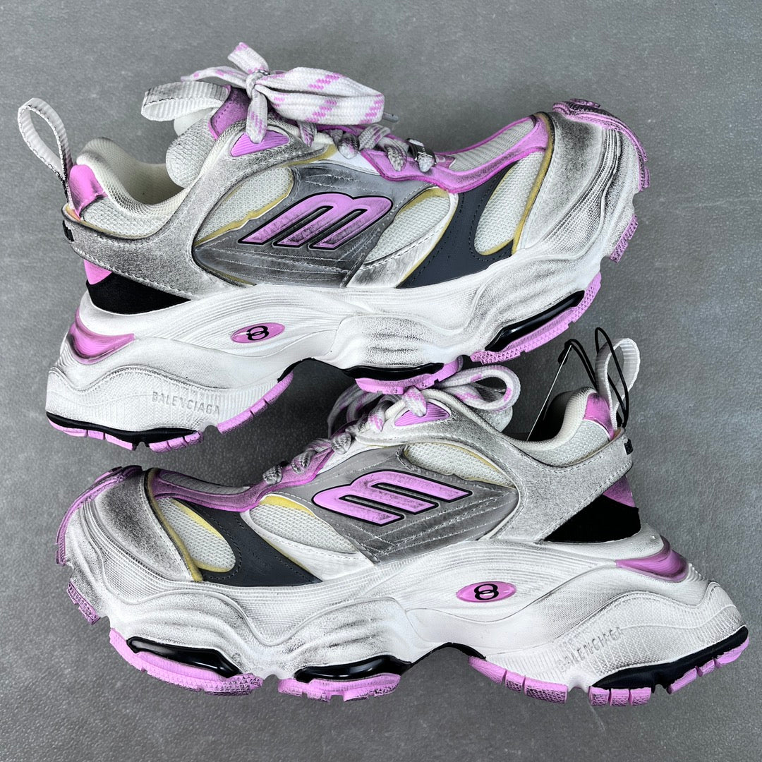 Two-tone silver and white sneaker with purple accents, chunky sole, lace-up and straps