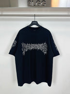 Black T-shirt with white gothic logo graphic across chest