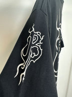 Black T-shirt back and sleeve with partial white logo print