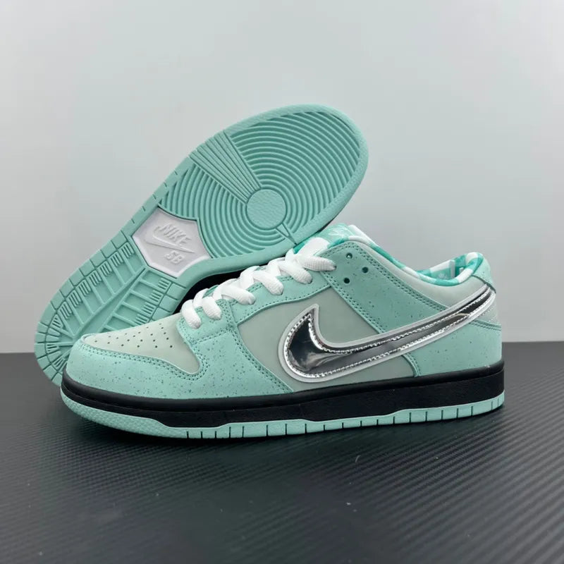 Aqua low-top sneakers with silver swoosh, black midsole, and teal outsole