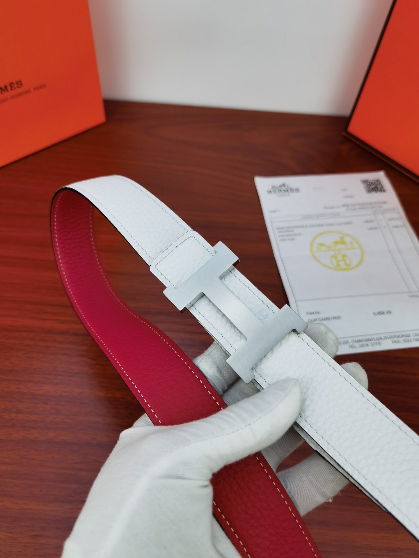Hermes reversible belt, light blue front and red underside, with silver-toned buckle