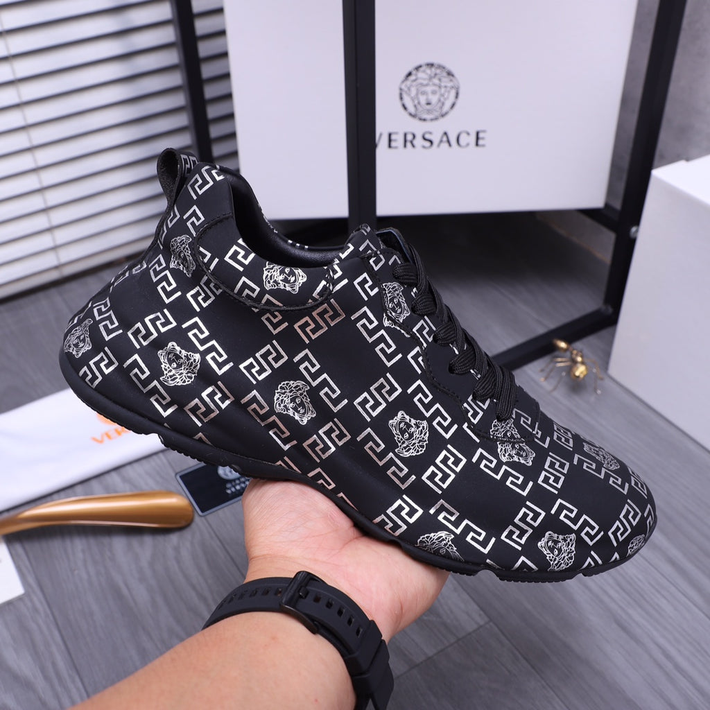 Versace luxury shoes low-top sneakers with dark uppers and white logo pattern