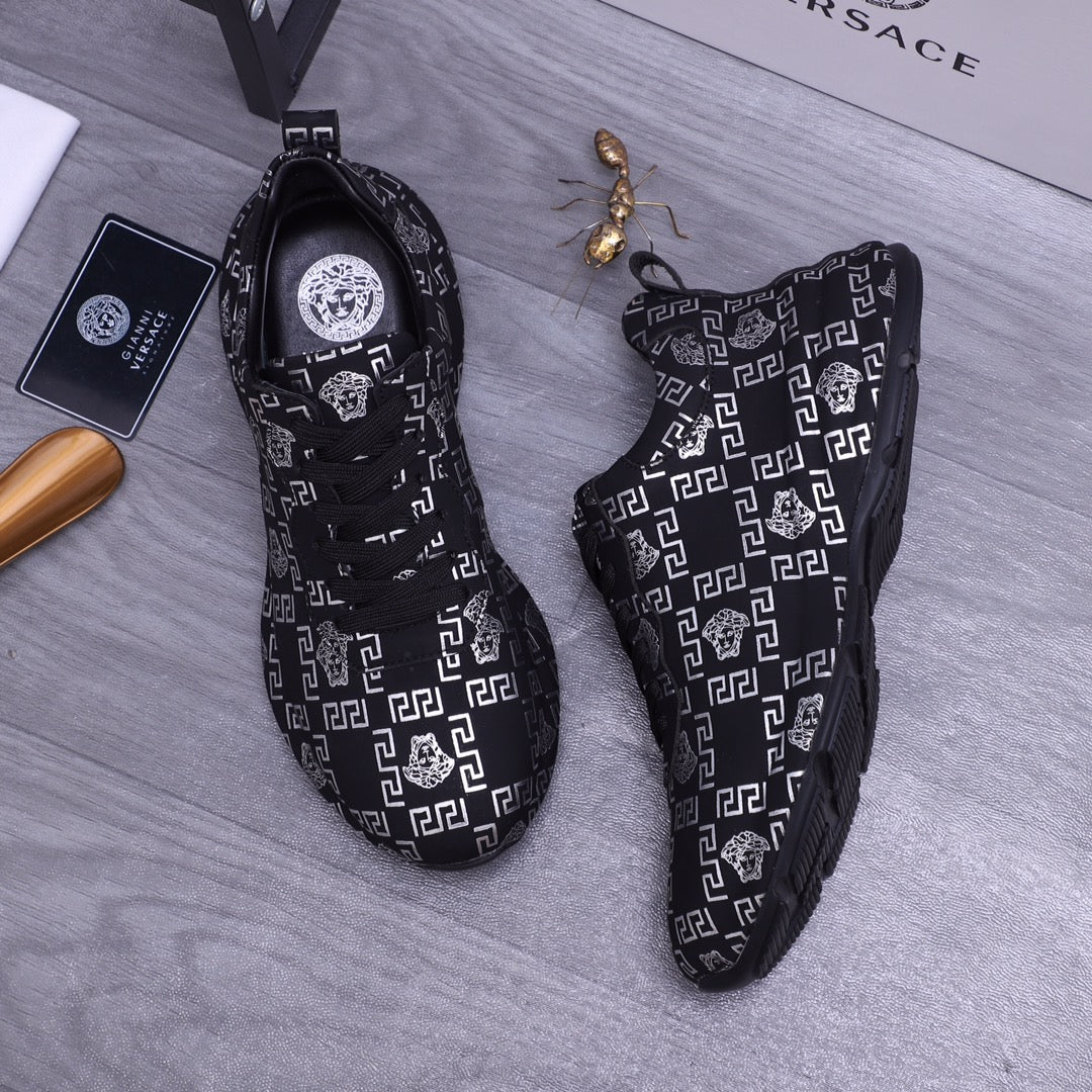 Versace luxury shoes lace-up sneakers with dark knit and white geometric logo motifs
