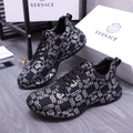 Versace luxury shoes low-top sneakers in dark knit with white geometric logo pattern