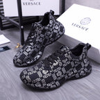 Versace luxury shoes low-top sneakers in dark knit with white geometric logo pattern