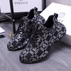 Versace luxury shoes lace-up sneakers in dark fabric with repeating white geometric logo