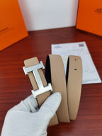 Hermes reversible belt buckle on light beige leather strap with matching keeper holes