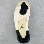 Shoe outsole with textured tread and Jumpman logo, beige and black pattern