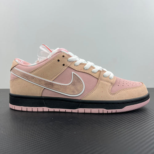 Beige and pink low-top sneaker with white laces, swoosh logo, and black outsole