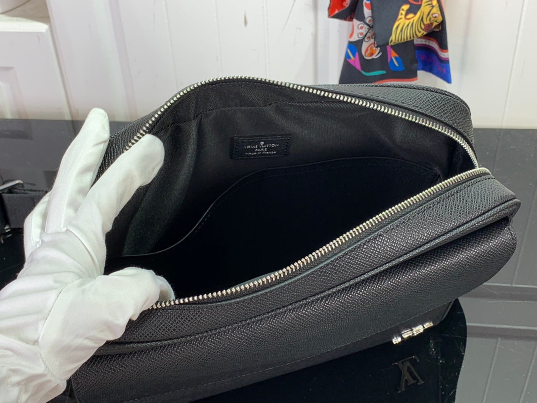 Louis Vuitton bag interior view with zip opening and black fabric lining