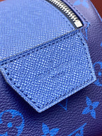 Blue monogram grained leather panel with embossed logo