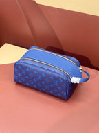 Blue monogram zip vanity bag with front zipper and short strap
