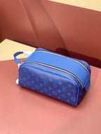 Blue monogram zip vanity bag with adjustable shoulder strap