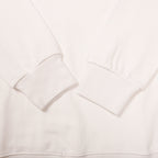 White crewneck sweatshirt with ribbed cuffs and neckline