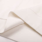 White sweatshirt fabric detail with ribbed hem