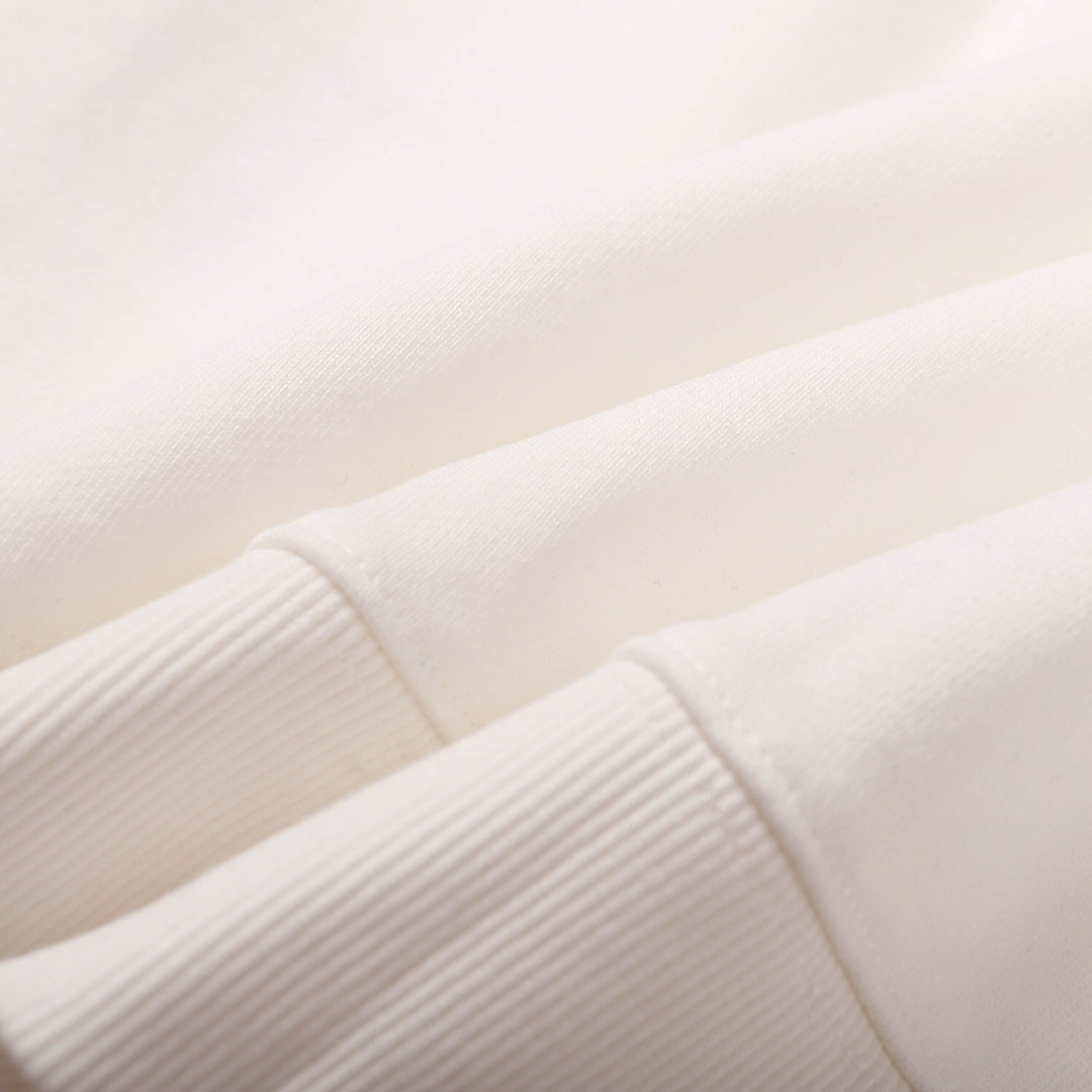 White sweatshirt sleeve seam with ribbed cuff edge