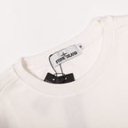 White crewneck sweatshirt neckline with brand label tag