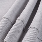 Grey sweatshirt sleeve cuffs with ribbed knit detail