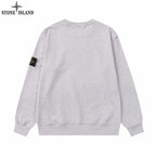 Grey crewneck sweatshirt, long sleeves with Stone Island sleeve patch