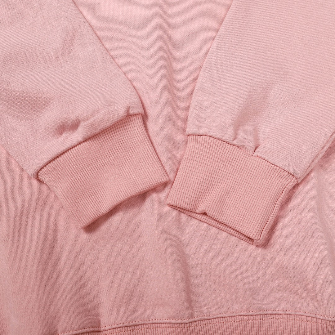 Pink sweatshirt sleeve cuffs and hem with ribbed knit detailing