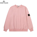 Pink crewneck sweatshirt with long sleeves and ribbed cuffs