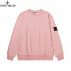 Pink crewneck sweatshirt with long sleeves and ribbed cuffs