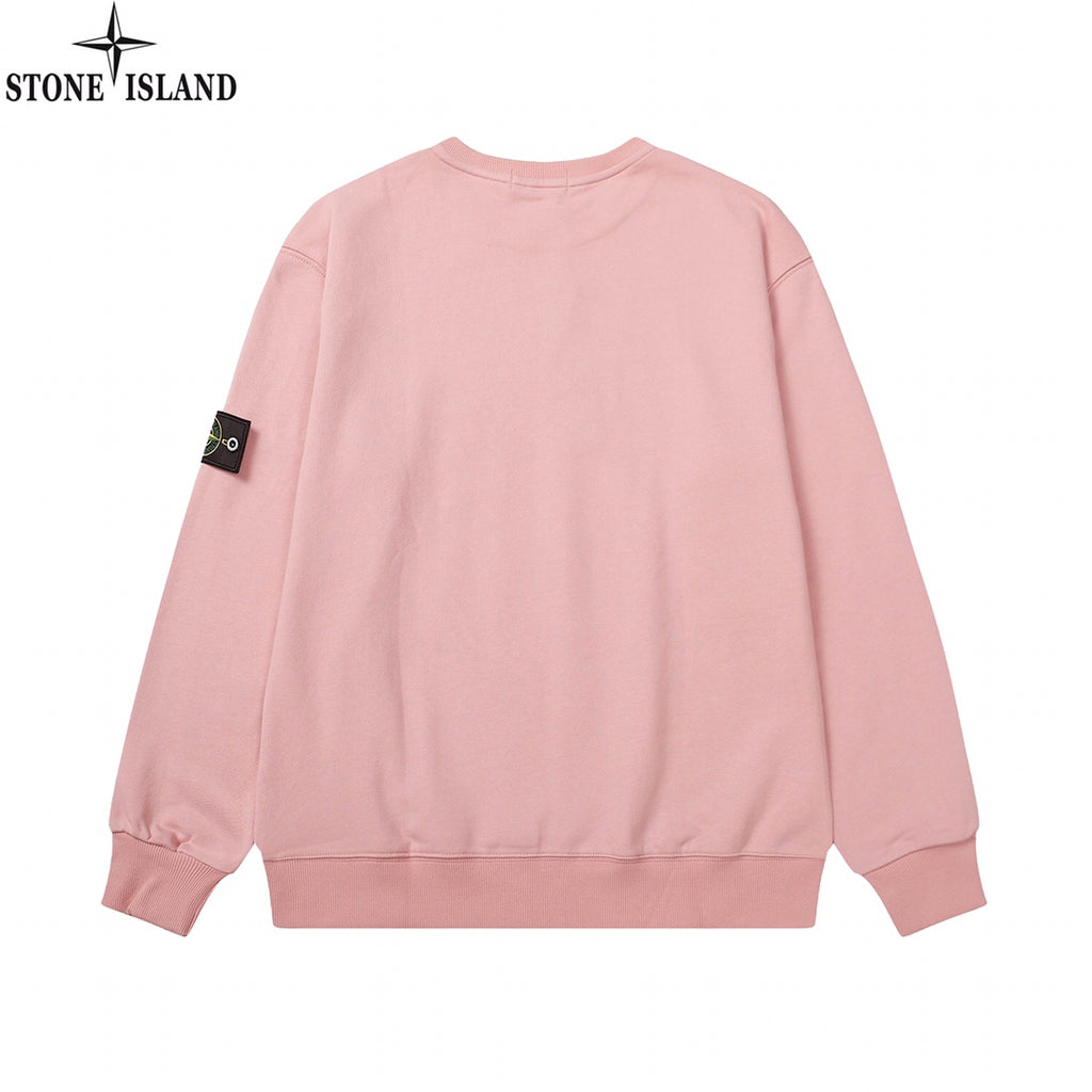 Pink crewneck sweatshirt with small logo patch on the sleeve