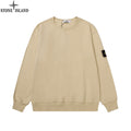 Beige crewneck sweatshirt with long sleeves and ribbed cuffs