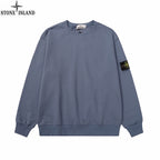 Stone Island crewneck sweatshirt, slate blue, ribbed hem and cuffs, front view