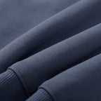Stone Island crewneck sweatshirt, slate blue, close-up of knit fabric and sleeve cuff