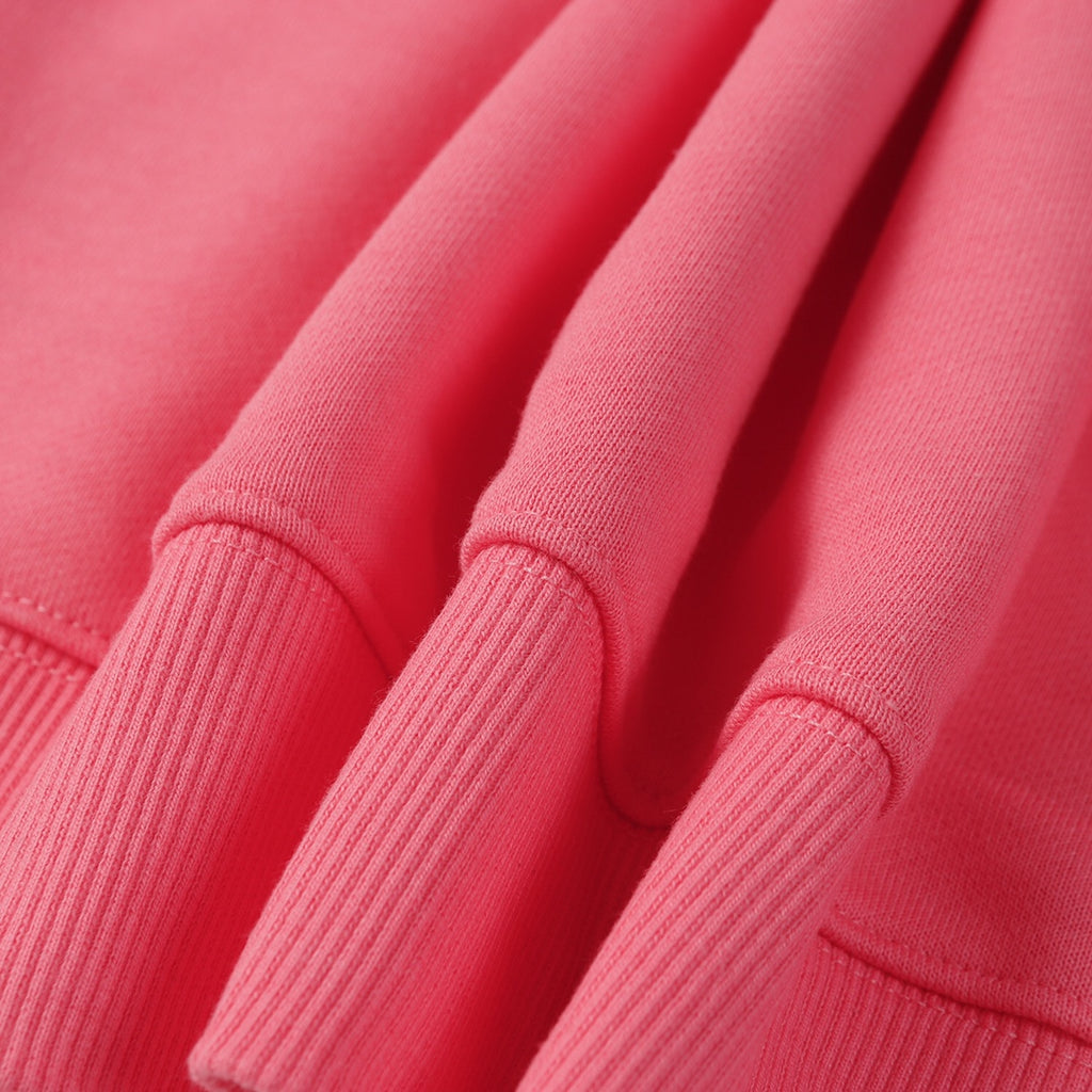 Stone Island pink sweatshirt fabric and ribbed cuffs close-up showing knit texture