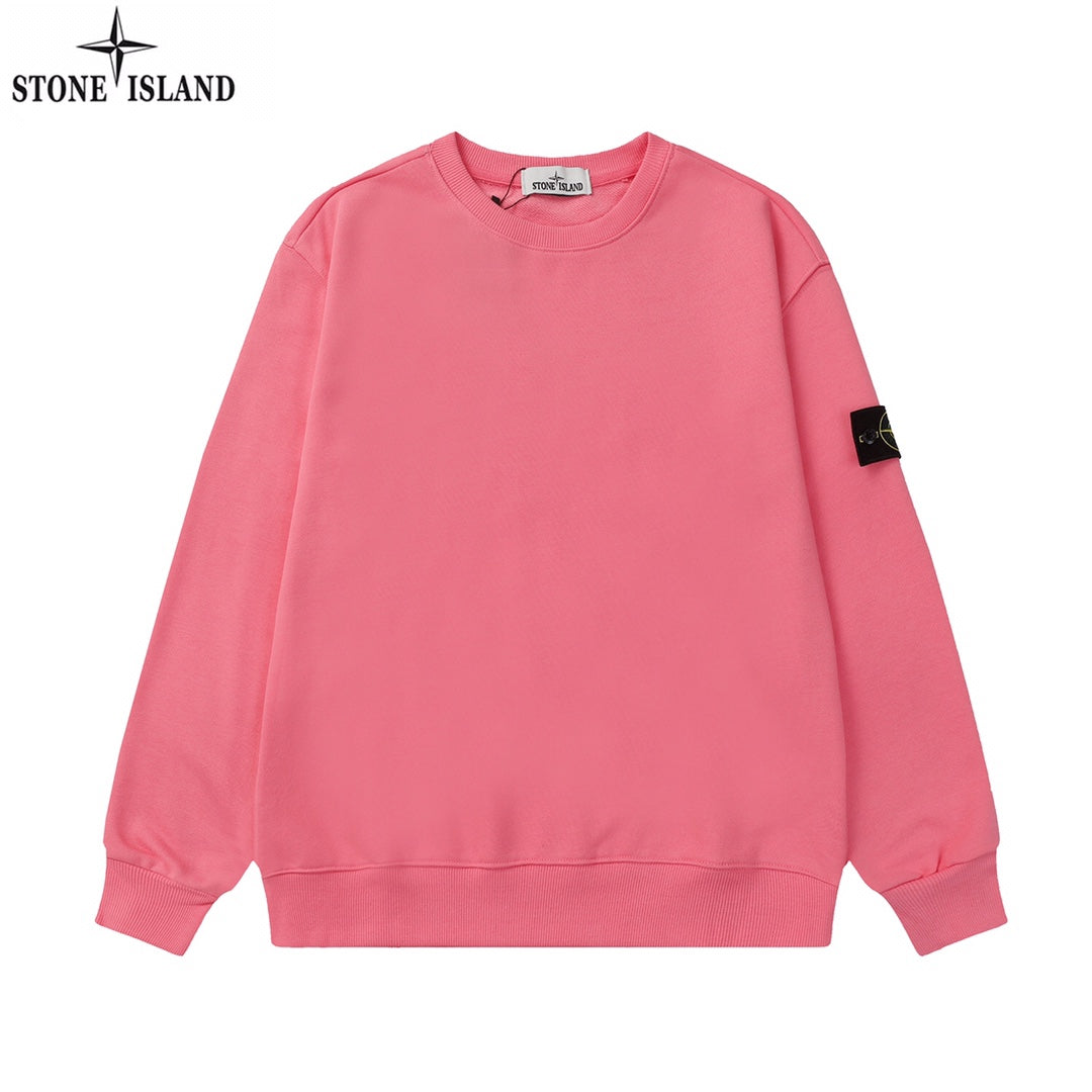 Stone Island crewneck sweatshirt in pink with ribbed cuffs and hem; black logo patch on sleeve